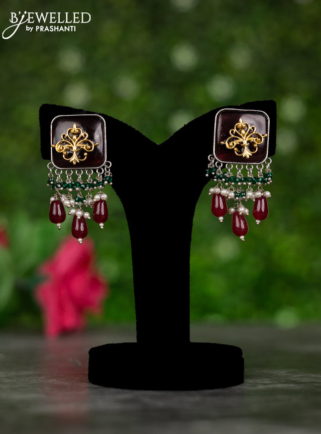 Oxidised earrings with maroon stones and pearl & maroon beads hangings