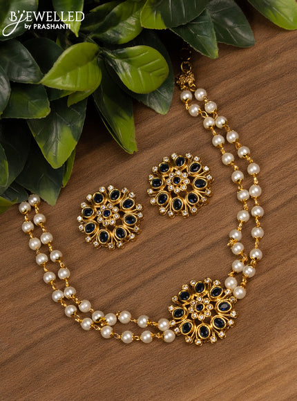 Pearl floral design choker with sapphire & cz stone