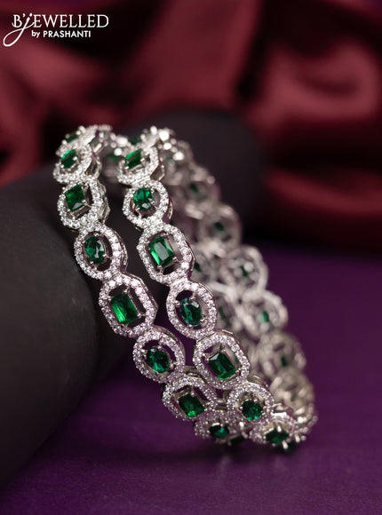 Zircon bangles with emerald and cz stones