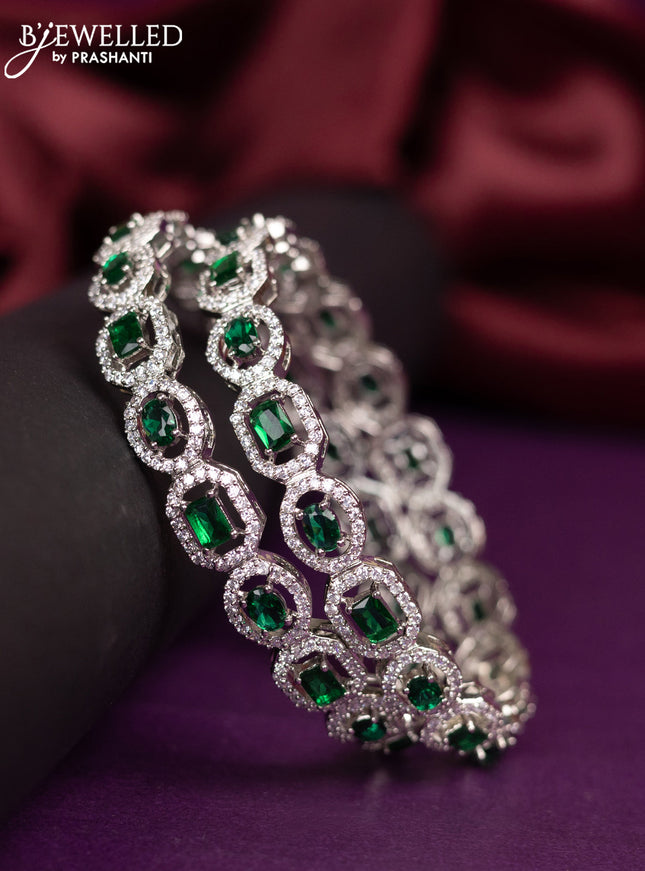 Zircon bangles with emerald and cz stones