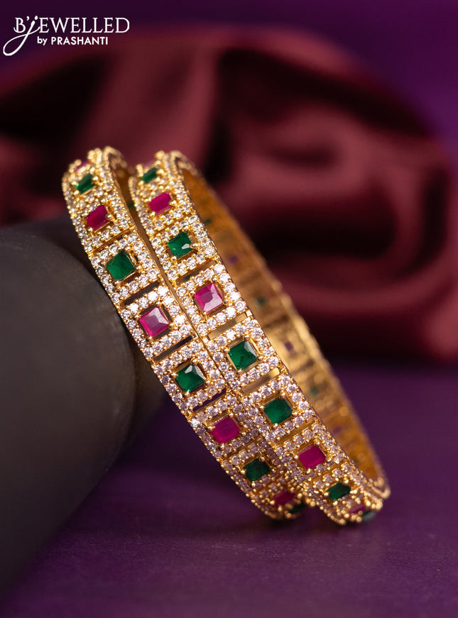 Zircon bangles with kemp and cz stones in gold finish