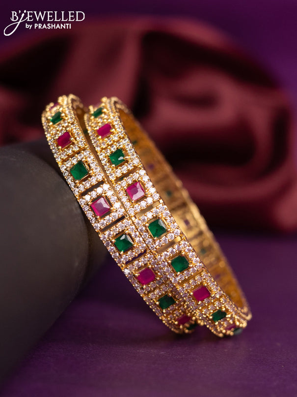Zircon bangles with kemp and cz stones in gold finish