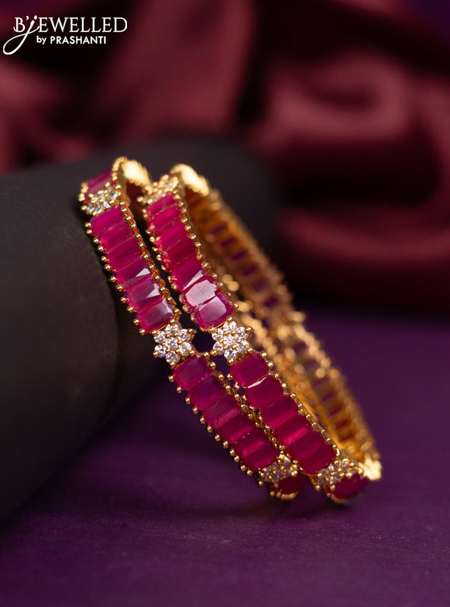 Zircon bangles with ruby and cz stones in gold finish
