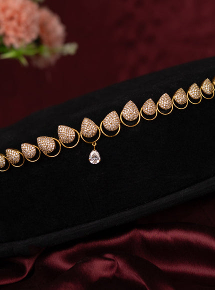 Zircon hip chain with cz stone in gold finish