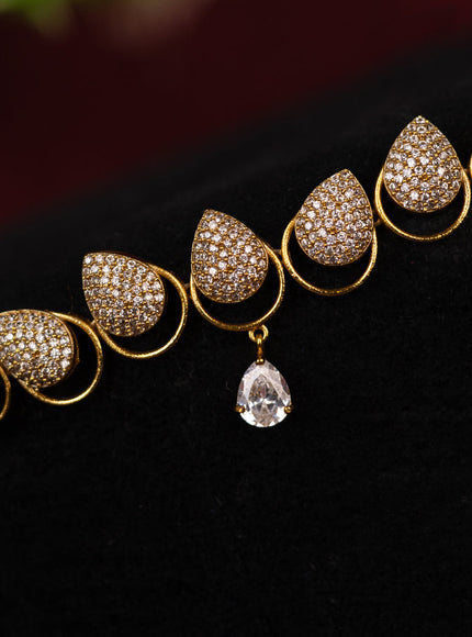 Zircon hip chain with cz stone in gold finish