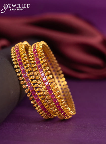 Antique bangles with pink kemp stones