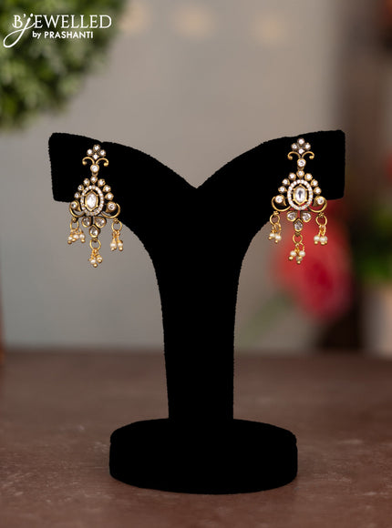 Earring with cz stone and pearl hangings in victorian finish