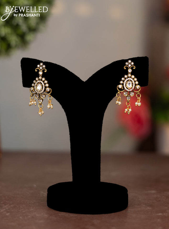 Earring with cz stone and pearl hangings in victorian finish
