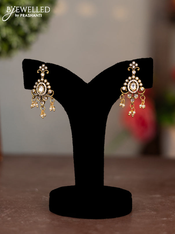 Earring with cz stone and pearl hangings in victorian finish