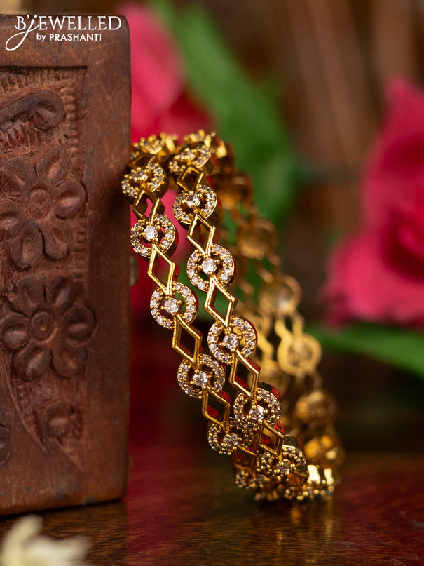 Zircon bangles with cz stone in gold finish