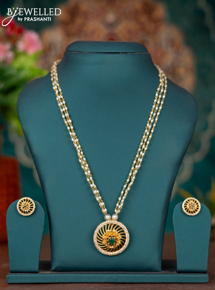 Pearl necklace with kemp and cz stones
