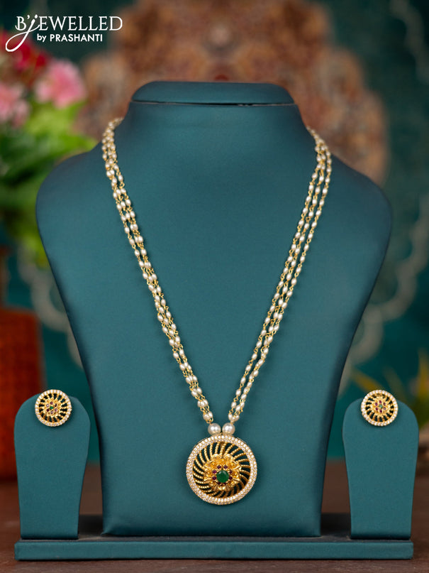 Pearl necklace with kemp and cz stones