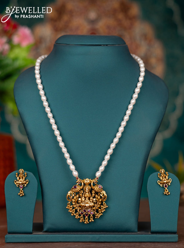Pearl necklace lakshmi pendant with ruby stones and golden beads hangings