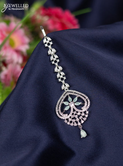 Zircon maang tikka with mint green & cz stones and hangings