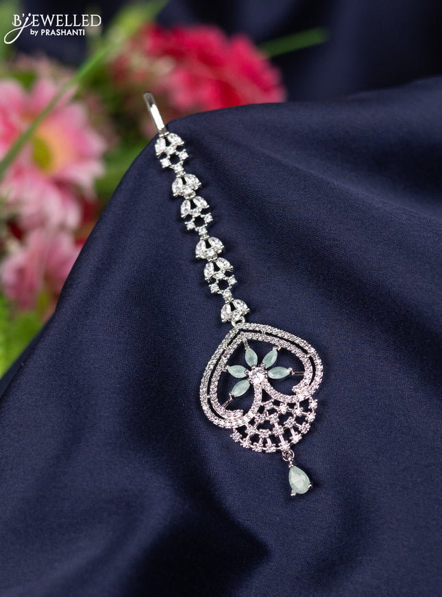 Zircon maang tikka with mint green & cz stones and hangings