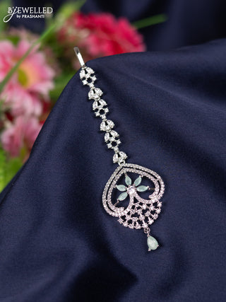 Zircon maang tikka with mint green & cz stones and hangings