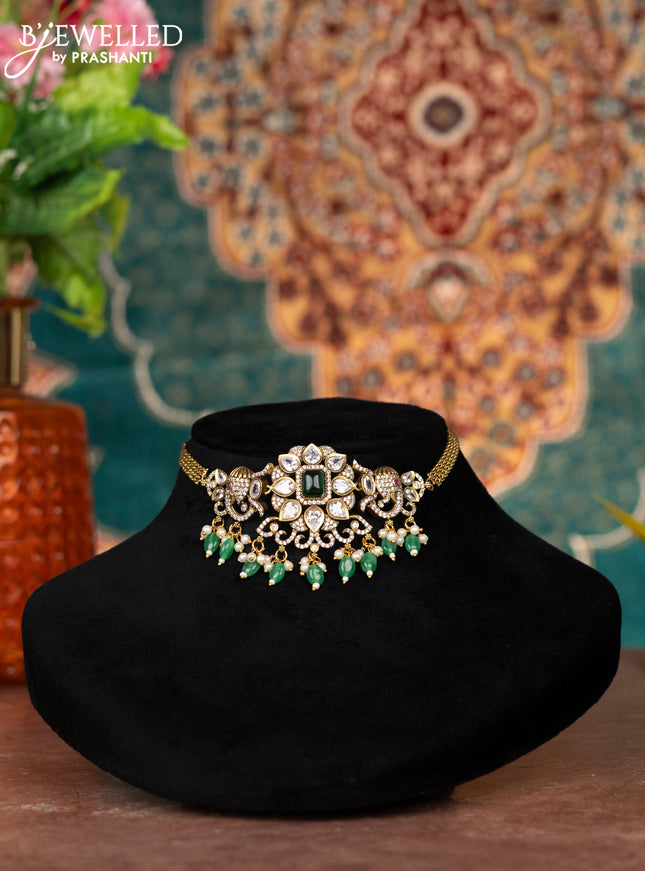 Victorian finish choker elephant design with kemp & cz stones and green beads hanging