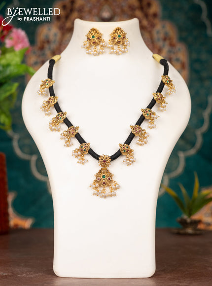 Black thread necklace with kemp stones and pearl hangings