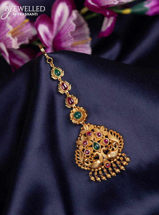 Antique maang tikka peackck design with kemp stones and golden beads hanging