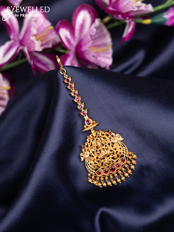 Antique maang tikka lakshmi design with pink kemp stones and golden beads hanging