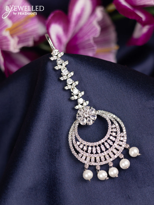 Zircon maang tikka with cz stones and pearl hanings