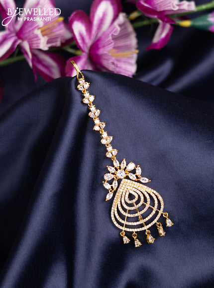 Zircon maang tikka with cz stones and hanings in gold finish