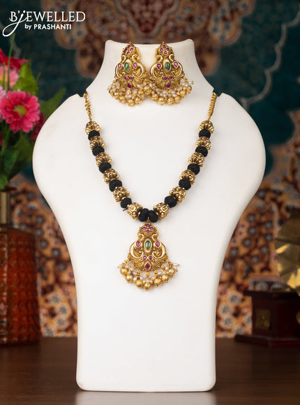 Black thread necklace peacock design with kemp & pearl and golden beads hanging