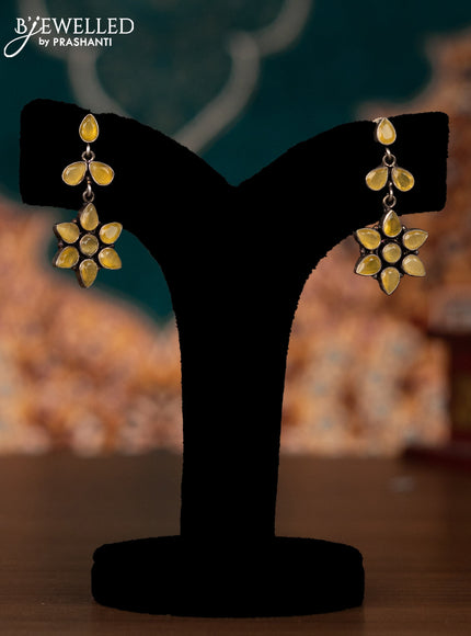 Oxidised earring floral design with yellow stones