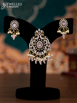 Pendant set peacock design with baby pink & cz stones and pearl & beads hangings in victorian finish