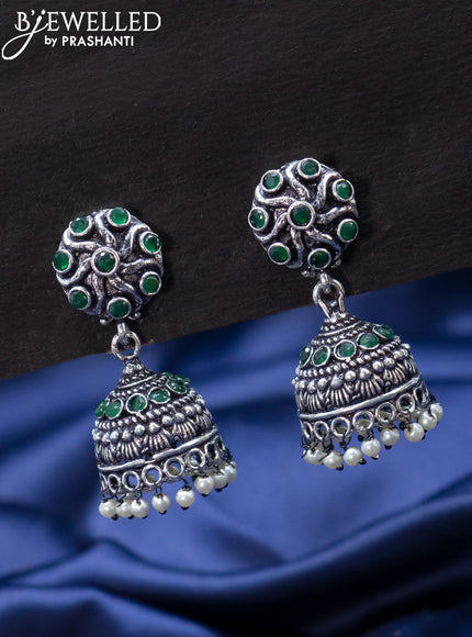 Oxidised jhumka with emerald stones and pearl hangings