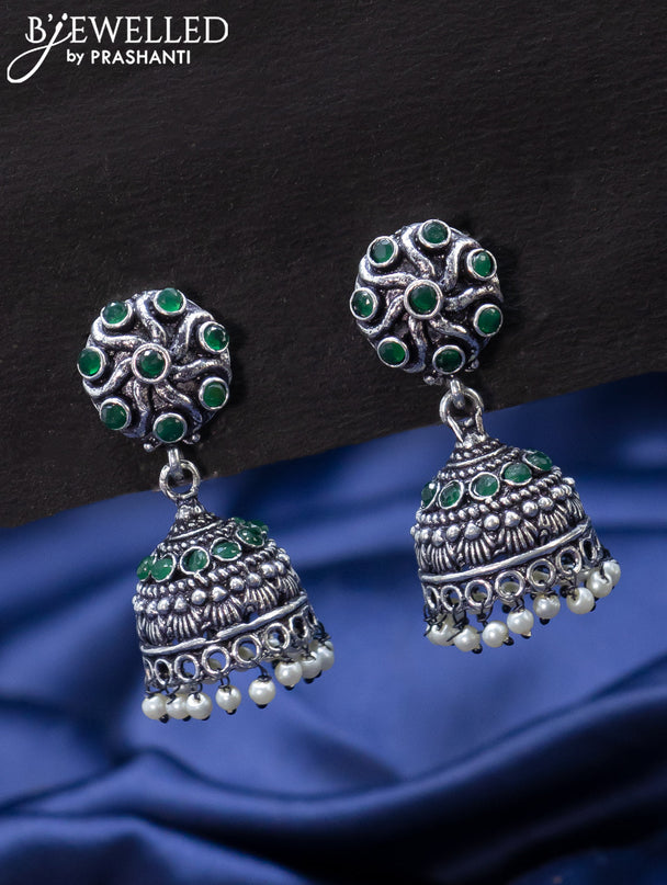 Oxidised jhumka with emerald stones and pearl hangings