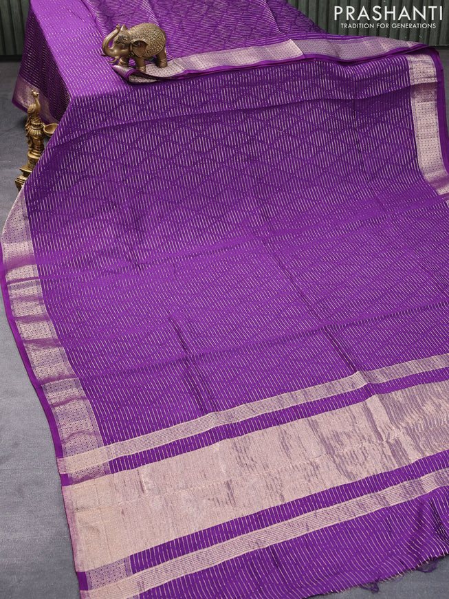 Chinon silk saree violet with allover geometric zari weaves and zari woven border with pichwai printed blouse