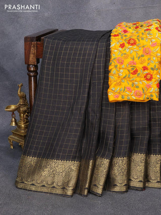 Dola silk saree black and yellow with zari checked pattern and zari woven border with embroidery work blouse