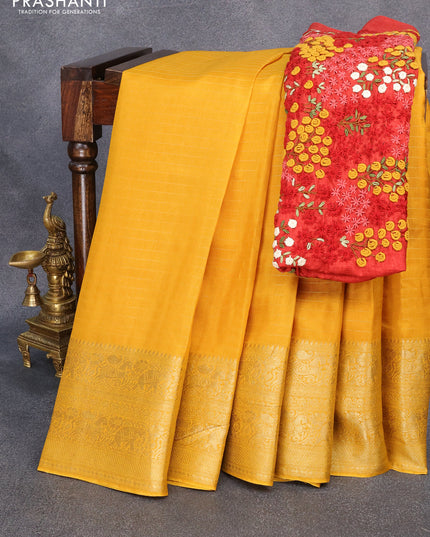 Dola silk saree yellow and red with allover zari woven stripes pattern and long zari woven border with embroidery work blouse
