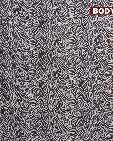 Banarasi cotton saree black and maroon with allover wavy prints and zari woven border