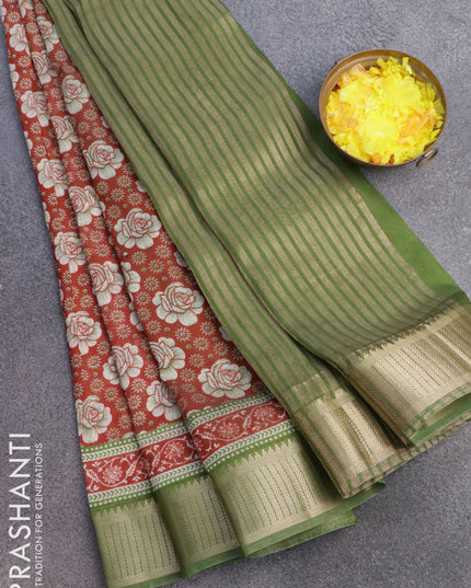 Banarasi cotton saree rust shade and green with allover floral prints and zari woven border
