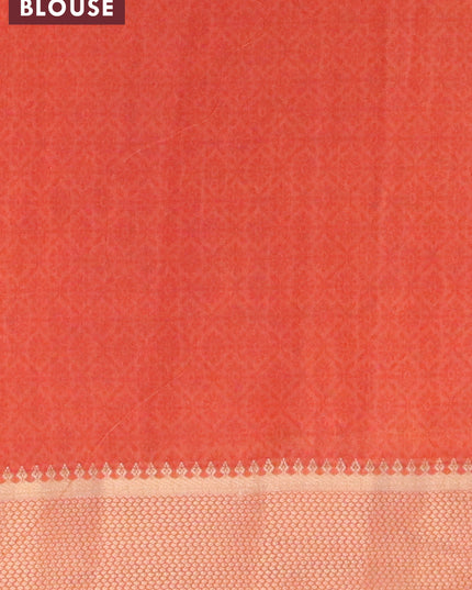 Banarasi cotton saree green and rust shade with allover geometric prints and zari woven border