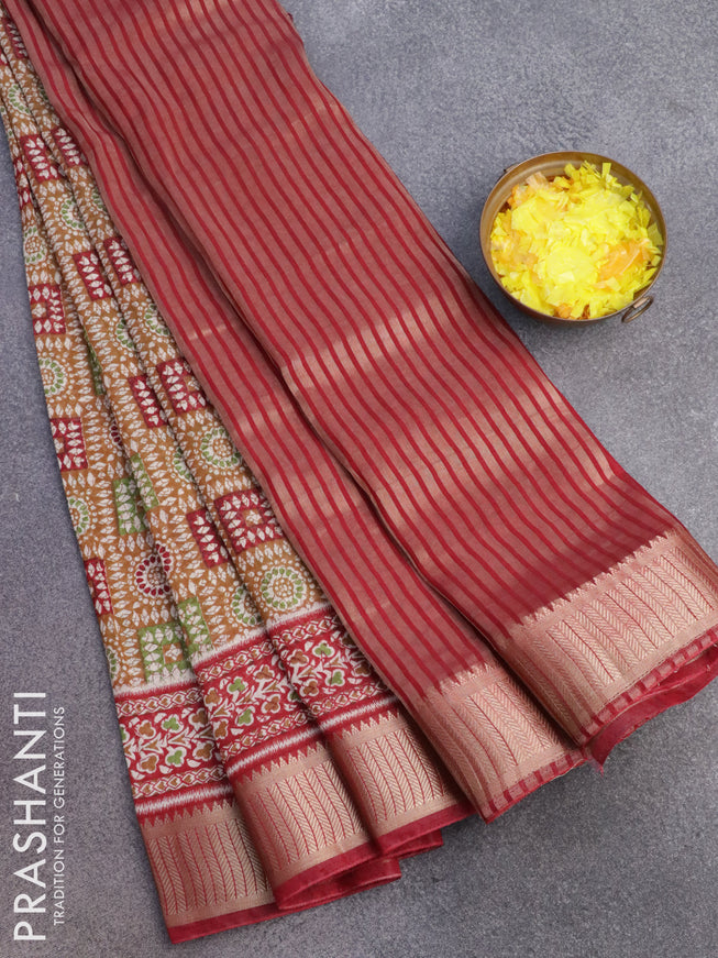 Banarasi cotton saree dark mustard and maroon with allover batik prints and zari woven border