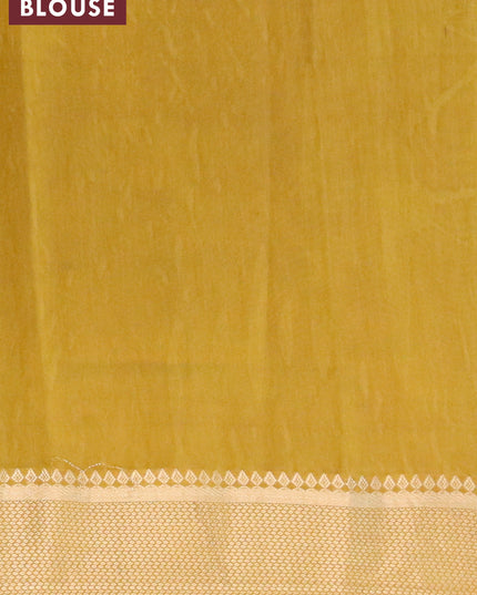 Banarasi cotton saree lime green with allover prints and zari woven border