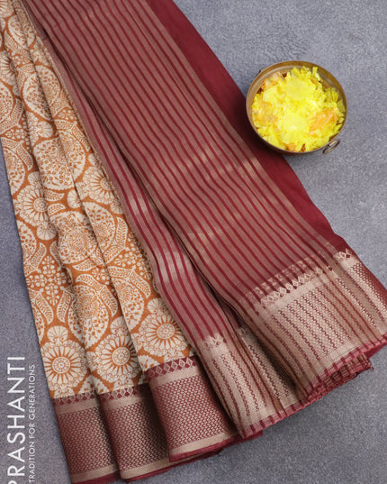 Banarasi cotton saree dark mustard and maroon with allover prints and zari woven border
