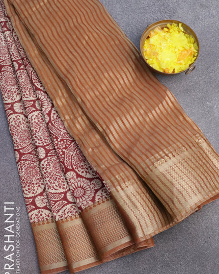 Banarasi cotton saree maroon and rust shade with allover prints and zari woven border