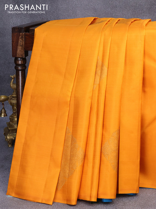 Pure kanjivaram silk saree mustard yellow and dual shade of teal bluish green with zari woven buttas in borderless style