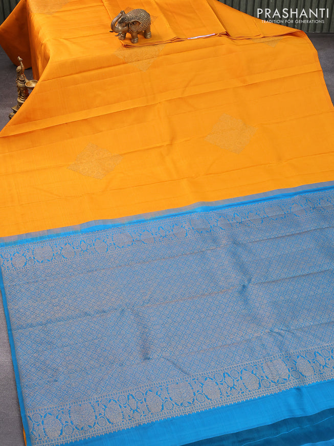 Pure kanjivaram silk saree mustard yellow and dual shade of teal bluish green with zari woven buttas in borderless style