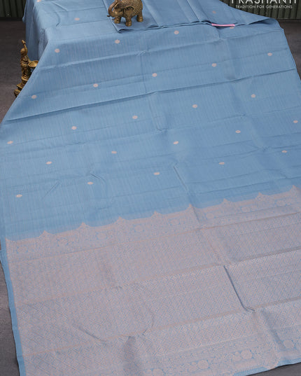 Pure kanjivaram silk saree pastel blue shade with allover zari stripes pattern & zari buttas in borderless style