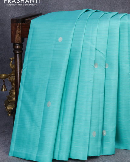Pure kanjivaram silk saree teal blue with allover zari stripes pattern & zari buttas in borderless style