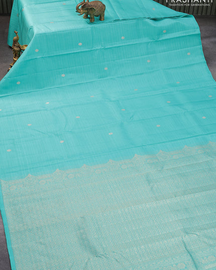 Pure kanjivaram silk saree teal blue with allover zari stripes pattern & zari buttas in borderless style