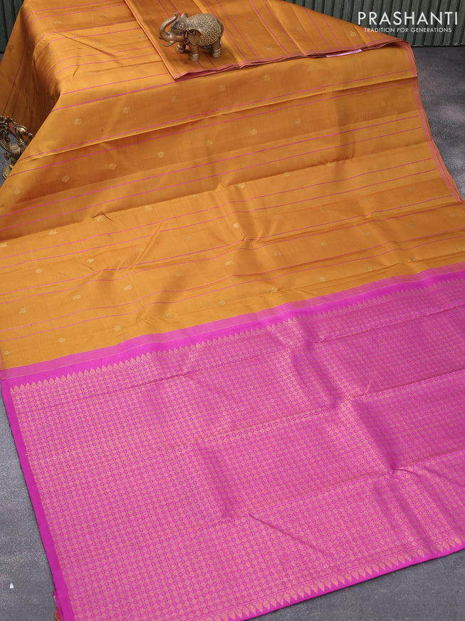 Pure kanjivaram silk saree dark mustard and purple with allover thread weaves & zari buttas in borderless style
