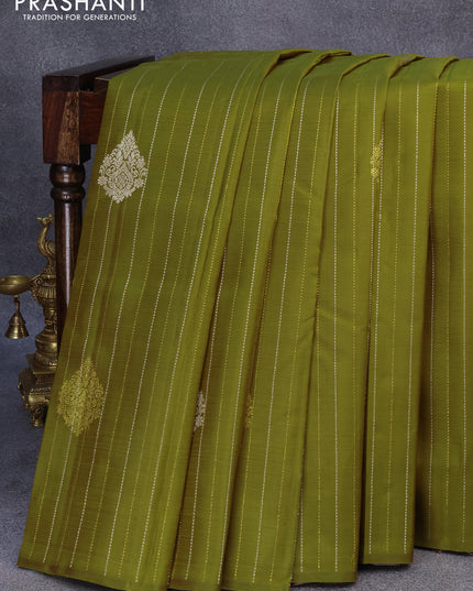 Pure kanjivaram silk saree mehendi green and brown shade with allover silver & gold zari weave buttas in borderless style