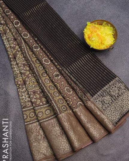 Dola silk saree chiku shade with allover ajrakh prints and zari woven floral border - {{ collection.title }} by Prashanti Sarees