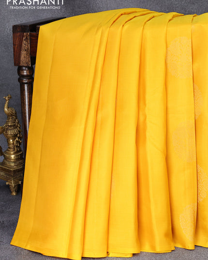 Pure kanjivaram silk saree yellow and dark green with zari woven buttas in borderless style
